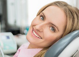 Smiling woman in dental chair