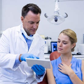 A female patient at the dentist office