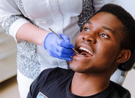 A male patient at the dentist office