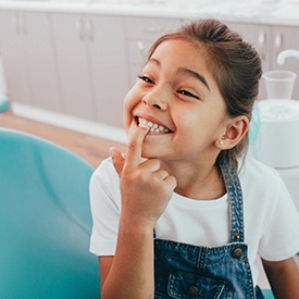 young girl happy after receiving children’s dentistry in Acworth