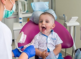 young girl happy after receiving children’s dentistry in Acworth