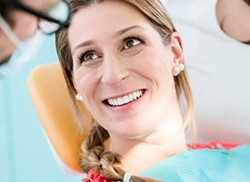 Smiling woman in dental chair