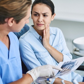 Woman listening to her emergency dentist in Acworth