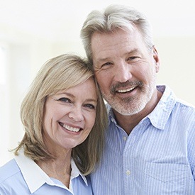 Smiling older man and woman