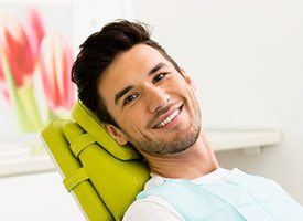 Relaxed man smiling in dental chair