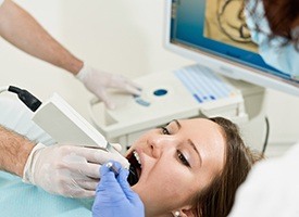 Woman receiving digital impression scans