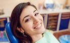 Smiling woman in dental chair