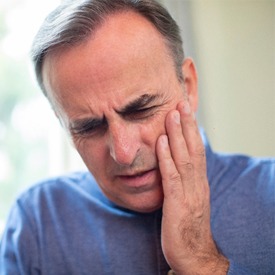 Man with tooth pain