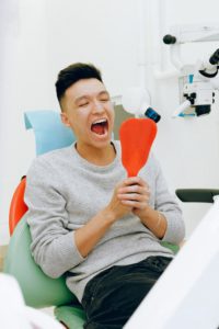 Man looking at the part of the mouth