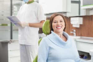 Woman at dentist to replace metal fillings